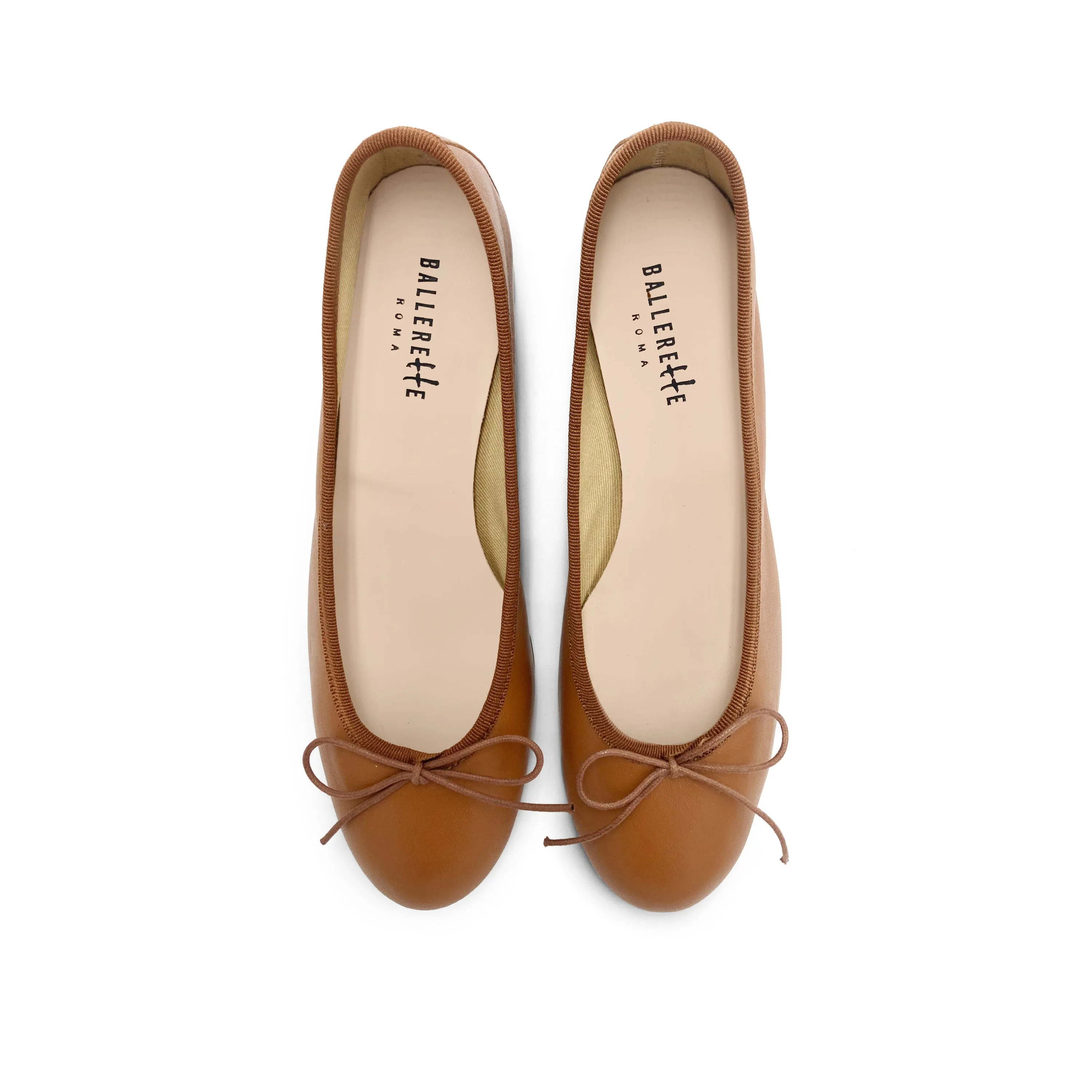 Tan leather ballet flats with heel